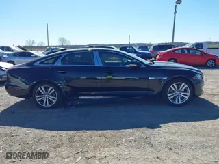 2018 Jaguar XJ with VIN SAJWJ2GD2J8W13463, listed as a IAAI auction lot 41897451 with 70,448 mi miles. Bid and sale history available at carsss.com. Image 13.