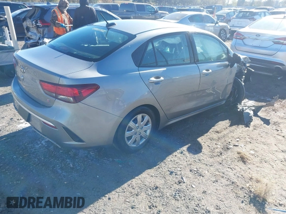 2021 Kia Rio LX with VIN 3KPA24AD1ME398923, listed as a IAAI auction lot 41031202 with 48,919 mi miles. Bid and sale history available at carsss.com. Image 4.