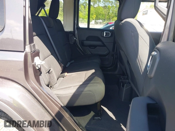 2022 Jeep Wrangler Unlimited Sahara with VIN 1C4HJXEN2NW194502, listed as a IAAI auction lot 42002455 with 34,861 mi miles and . Bid and sale history available at DreamBid. Image 8.
