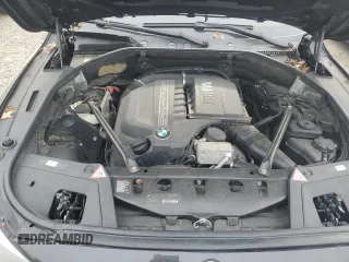 2014 BMW 5 Series 535i Gran Turismo xDrive z VIN WBA5M4C57ED183502, wystawiony jako Copart lot #80259304 z przebiegiem 179 066 mil mil oraz Szkoda całkowita • Salvage title. Historia ofert i sprzedaży dostępna na DreamBid. Obrazek 11.