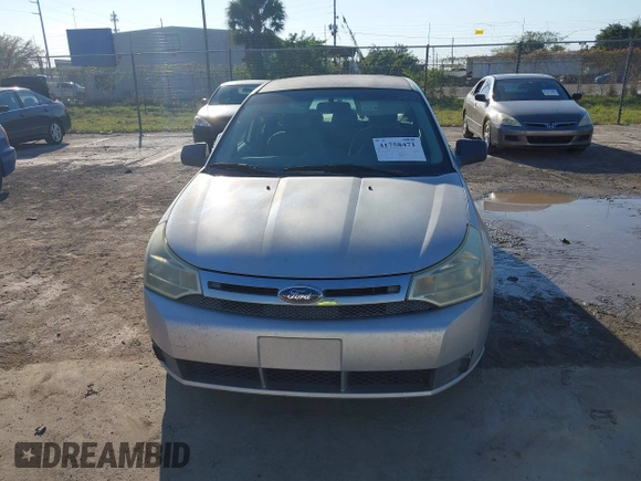 2009 Ford Focus S with VIN 1FAHP34N79W221813, listed as a IAAI auction lot 41758471 with 248,531 mi miles. Bid and sale history available at carsss.com. Image 12.