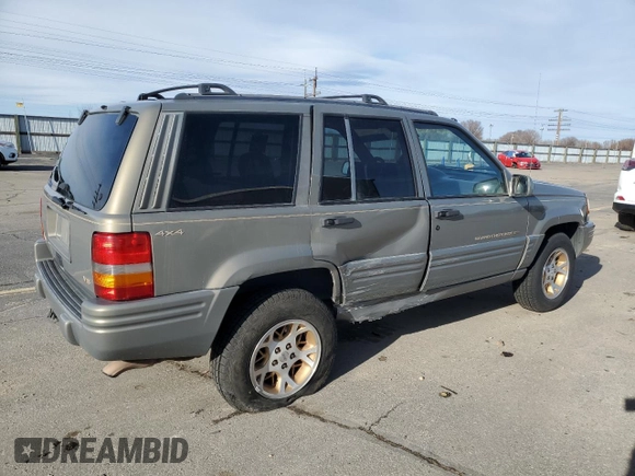 1997 Jeep Grand Cherokee Limited with VIN 1J4GZ78Y4VC754624, listed as a Copart auction lot 49884435 with 144,682 mi miles and Salvage Title. Bid and sale history available at carsss.com. Image 3.