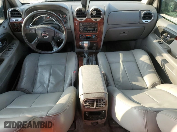 2006 GMC Envoy SLT with VIN 1GKDS13S962230376, listed as a Copart auction lot 43613965 with 136,462 mi miles and Salvage Title. Bid and sale history available at carsss.com. Image 8.