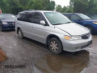 2003 Honda Odyssey EX-L z VIN 5FNRL18023B031779, wystawiony jako IAAI lot #42515027 z przebiegiem 231 259 mil mil oraz . Historia ofert i sprzedaży dostępna na DreamBid. Obrazek 1.