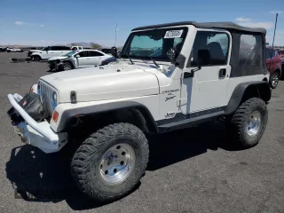 2001 Jeep Wrangler Sport z VIN 1J4FA49S21P346668, wystawiony jako Copart lot #62750535 z przebiegiem 186 606 mil mil oraz Szkoda całkowita • Salvage title. Historia ofert i sprzedaży dostępna na DreamBid. Obrazek 1.