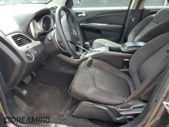 2014 Dodge Journey American Value with VIN 3C4PDCAB1ET135504, listed as a Copart auction lot 58803645 with 164,501 mi miles and Clean title. Bid and sale history available at DreamBid. Image 7.