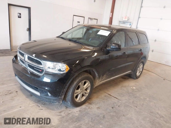 2013 Dodge Durango SXT with VIN 1C4RDJAG1DC681416, listed as a IAAI auction lot 42390313 with 222,022 mi miles and . Bid and sale history available at DreamBid. Image 2.