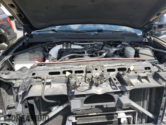 2015 GMC Sierra 2500HD Denali z VIN 1GT120E82FF160626, wystawiony jako Copart lot #57807735 z przebiegiem 193 495 mil mil oraz Szkoda całkowita • Salvage title. Historia ofert i sprzedaży dostępna na DreamBid. Obrazek 11.