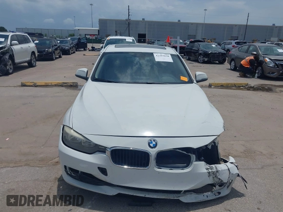 2013 BMW 3 Series 320i with VIN WBA3B1C50DK129576, listed as a IAAI auction lot 42393038 with 160,370 mi miles and . Bid and sale history available at DreamBid. Image 12.