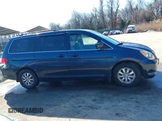 2010 Honda Odyssey EX-L with VIN 5FNRL3H76AB058912, listed as a IAAI auction lot 41558361 with 206,841 mi miles and . Bid and sale history available at DreamBid. Image 13.