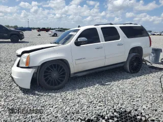 2013 GMC Yukon XL SLT with VIN 1GKS1KE03DR253071, listed as a Copart auction lot 51437355 with 194,807 mi miles and Salvage Title. Bid and sale history available at DreamBid. Image 1.
