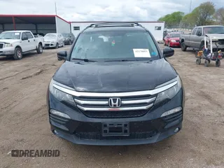 2017 Honda Pilot EX-L with VIN 5FNYF6H51HB045854, listed as a IAAI auction lot 42178053 with 114,913 mi miles and . Bid and sale history available at DreamBid. Image 13.