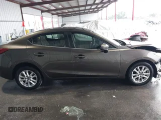 2015 Mazda 3 i Touring with VIN 3MZBM1V72FM215729, listed as a IAAI auction lot 42191673 with 141,471 mi miles and . Bid and sale history available at DreamBid. Image 14.