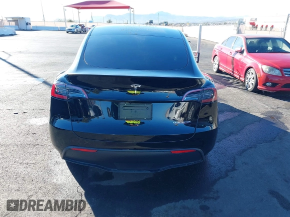 2023 Tesla Model Y Performance with VIN 7SAYGDEF6PF854797, listed as a IAAI auction lot 41319332 with 46,132 mi miles and . Bid and sale history available at DreamBid. Image 16.