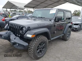 2022 Jeep Wrangler Willys Sport with VIN 1C4GJXAN7NW252931, listed as a IAAI auction lot 40972143 with 12,823 mi miles and . Bid and sale history available at DreamBid. Image 17.