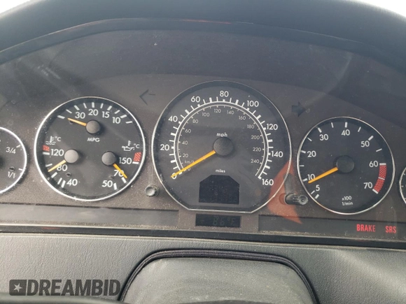 1999 Mercedes-Benz SL-Class with VIN WDBFA68F0XF182162, listed as a Copart auction lot 71390714 with 111,152 mi miles and Salvage Title. Bid and sale history available at carsss.com. Image 9.