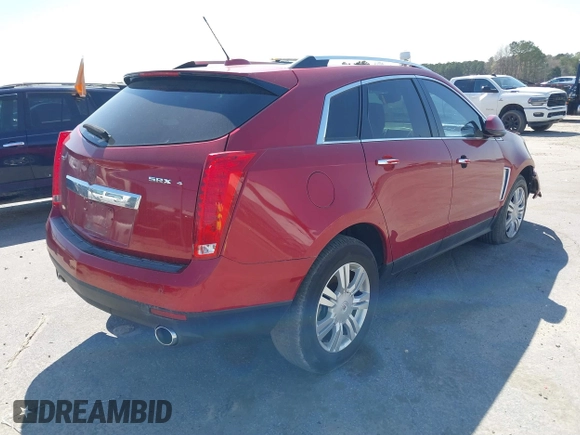 2015 Cadillac SRX Luxury Collection with VIN 3GYFNEE32FS539971, listed as a IAAI auction lot 41890592 with 90,843 mi miles. Bid and sale history available at carsss.com. Image 4.