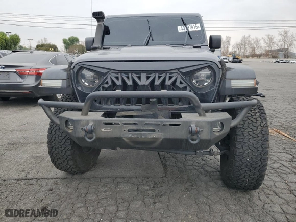 2021 Jeep Gladiator Rubicon with VIN 1C6JJTBG9ML512347, listed as a Copart auction lot 43197415 with 134,608 mi miles and Salvage Title. Bid and sale history available at carsss.com. Image 5.
