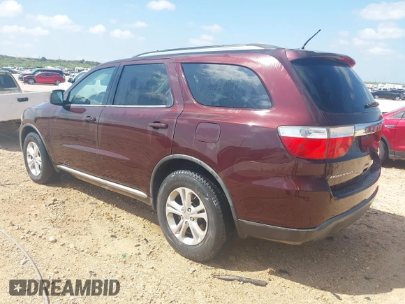 2012 Dodge Durango SXT with VIN 1C4RDHAG8CC361176, listed as a IAAI auction lot 42643631 with 201,419 mi miles and . Bid and sale history available at DreamBid. Image 3.