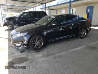 2013 Kia Optima SX z VIN 5XXGR4A65DG190896, wystawiony jako Copart lot #59630485 z przebiegiem 136 385 mil mil oraz Szkoda całkowita • Salvage title. Historia ofert i sprzedaży dostępna na DreamBid. Obrazek 1.