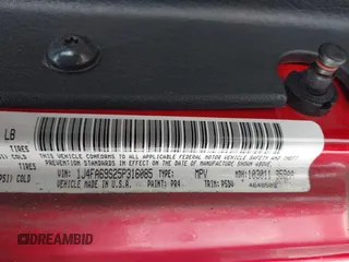2005 Jeep Wrangler Rubicon with VIN 1J4FA69S25P316085, listed as a IAAI auction lot 41503034 with 57,252 mi miles. Bid and sale history available at carsss.com. Image 9.