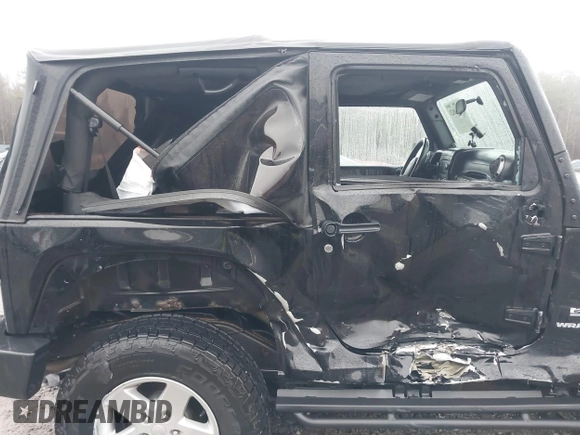 2012 Jeep Wrangler Sport z VIN 1C4AJWAG8CL262755, wystawiony jako IAAI lot #41566823 z przebiegiem 164 135 mil mil oraz . Historia ofert i sprzedaży dostępna na DreamBid. Obrazek 14.
