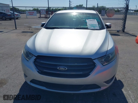2013 Ford Taurus SEL with VIN 1FAHP2E81DG129229, listed as a IAAI auction lot 41999326 with 205,856 mi miles. Bid and sale history available at carsss.com. Image 6.