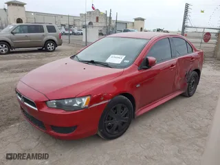 2015 Mitsubishi Lancer ES with VIN JA32U2FU6FU025259, listed as a IAAI auction lot 41345564 with 184,953 mi miles. Bid and sale history available at carsss.com. Image 2.