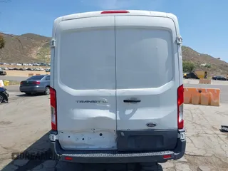 2017 Ford Transit Cargo z VIN 1FTYE1CM9HKB50925, wystawiony jako IAAI lot #42095471 z przebiegiem 152 583 mil mil oraz . Historia ofert i sprzedaży dostępna na DreamBid. Obrazek 16.
