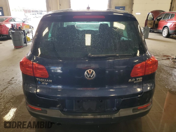 2013 Volkswagen Tiguan SE with VIN WVGBV7AX4DW518545, listed as a Copart auction lot 64585175 with 104,030 mi miles and Salvage title. Bid and sale history available at DreamBid. Image 6.