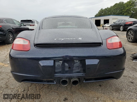 2006 Porsche Cayman S с VIN WP0AB298X6U781940, выставлен на аукционе Copart как лот 70092204 с пробегом 116 506 миль миль и Списание • Salvage title. История ставок и продаж доступна на DreamBid. Изображение 6.