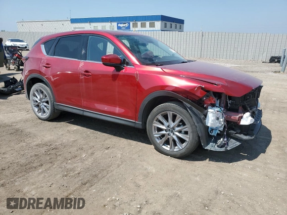 2019 Mazda CX-5 Grand Touring with VIN JM3KFBDM7K1668396, listed as a Copart auction lot 59732785 with 23,855 mi miles and Salvage title. Bid and sale history available at DreamBid. Image 4.
