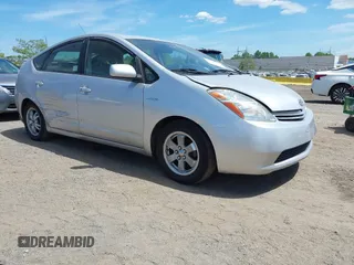 2009 Toyota Prius z VIN JTDKB20U793486724, wystawiony jako IAAI lot #42286331 z przebiegiem 196 215 mil mil oraz . Historia ofert i sprzedaży dostępna na DreamBid. Obrazek 1.