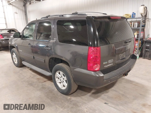 2010 GMC Yukon SLT with VIN 1GKUKCE08AR148548, listed as a IAAI auction lot 41994933 with 248,534 mi miles. Bid and sale history available at carsss.com. Image 3.