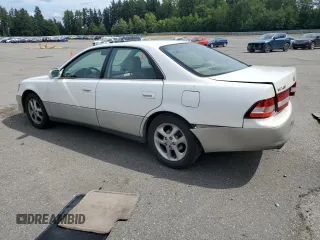 2000 Lexus ES 300 with VIN JT8BF28G6Y5099537, listed as a Copart auction lot 61873595 with 167,090 mi miles and Salvage title. Bid and sale history available at DreamBid. Image 2.