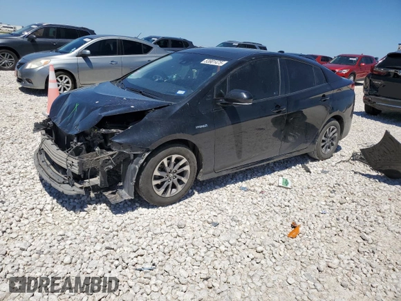 2019 Toyota Prius L Eco z VIN JTDKARFU7K3071668, wystawiony jako Copart lot #53901475 z przebiegiem 146 568 mil mil oraz Szkoda całkowita • Salvage title. Historia ofert i sprzedaży dostępna na DreamBid. Obrazek 1.