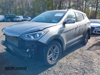 2018 Hyundai Santa Fe 2.4L z VIN 5NMZUDLB7JH077241, wystawiony jako IAAI lot #42135854 z przebiegiem 59 819 mil mil oraz . Historia ofert i sprzedaży dostępna na DreamBid. Obrazek 18.