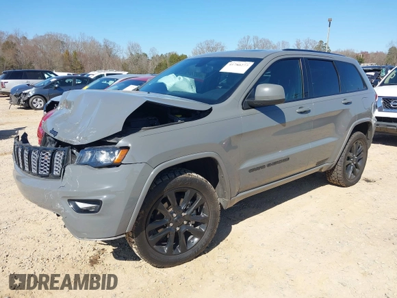 2019 Jeep Grand Cherokee Laredo E with VIN 1C4RJFAG2KC855108, listed as a IAAI auction lot 41780277 with 81,283 mi miles and . Bid and sale history available at DreamBid. Image 18.