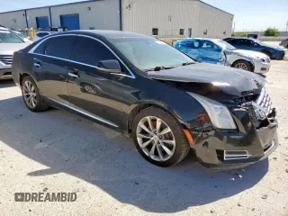 2014 Cadillac XTS Luxury z VIN 2G61M5S39E9302853, wystawiony jako Copart lot #57712215 z przebiegiem 180 886 mil mil oraz Czysty tytuł • Clean title. Historia ofert i sprzedaży dostępna na DreamBid. Obrazek 4.