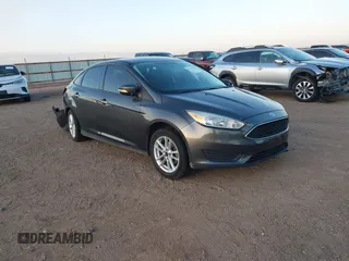 2016 Ford Focus SE z VIN 1FADP3F25GL340749, wystawiony jako IAAI lot #41777374 z przebiegiem 67 573 mil mil oraz . Historia ofert i sprzedaży dostępna na DreamBid. Obrazek 1.