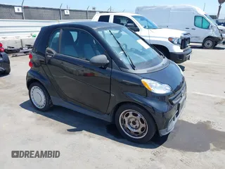 2015 Smart fortwo Passion with VIN WMEEJ3BA7FK802991, listed as a IAAI auction lot 42672202 with 45,850 mi miles and . Bid and sale history available at DreamBid. Image 1.