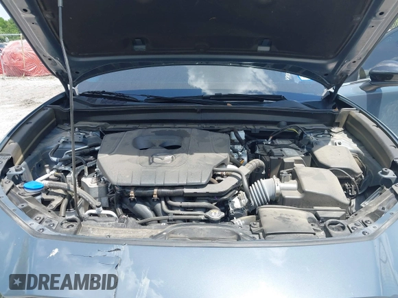 2024 Mazda CX-30 S Preferred with VIN 3MVDMBCM5RM648894, listed as a IAAI auction lot 42119860 with 23,857 mi miles and . Bid and sale history available at DreamBid. Image 10.