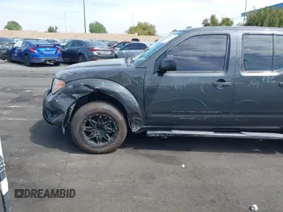 2014 Nissan Frontier SV with VIN 1N6AD0ER8EN756702, listed as a IAAI auction lot 42021294 with 135,143 mi miles and . Bid and sale history available at DreamBid. Image 6.
