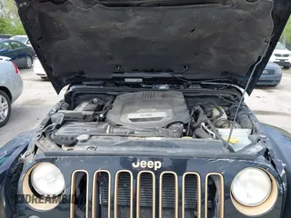 2014 Jeep Wrangler Unlimited Sahara with VIN 1C4BJWEG6EL189712, listed as a IAAI auction lot 42043053 with 108,716 mi miles. Bid and sale history available at carsss.com. Image 10.