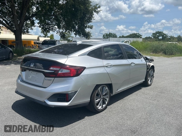 2019 Honda Clarity z VIN JHMZC5F14KC002619, wystawiony jako Copart lot #60905205 z przebiegiem 53 911 mil mil oraz Szkoda całkowita • Salvage title. Historia ofert i sprzedaży dostępna na DreamBid. Obrazek 4.