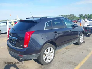 2014 Cadillac SRX Performance Collection with VIN 3GYFNCE39ES613051, listed as a IAAI auction lot 42113063 with 82,952 mi miles and . Bid and sale history available at carsss.com. Image 4.
