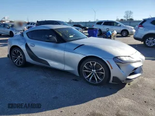 2022 Toyota GR Supra 2.0 with VIN WZ1DB2C08NW046734, listed as a Copart auction lot 83992154 with 43,576 mi miles and Salvage Title. Bid and sale history available at carsss.com. Image 4.