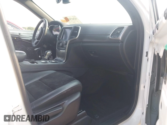 2018 Jeep Grand Cherokee Laredo with VIN 1C4RJFAGXJC121900, listed as a IAAI auction lot 42429505 with 72,351 mi miles and . Bid and sale history available at DreamBid. Image 5.