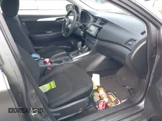 2019 Nissan Sentra S z VIN 3N1AB7AP0KY458040, wystawiony jako IAAI lot #42233788 z przebiegiem 110 419 mil mil oraz . Historia ofert i sprzedaży dostępna na DreamBid. Obrazek 5.
