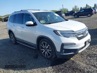 2021 Honda Pilot Touring 8-Passenger z VIN 5FNYF6H92MB031782, wystawiony jako IAAI lot #42087322 z przebiegiem 70 062 mil mil oraz . Historia ofert i sprzedaży dostępna na DreamBid. Obrazek 1.
